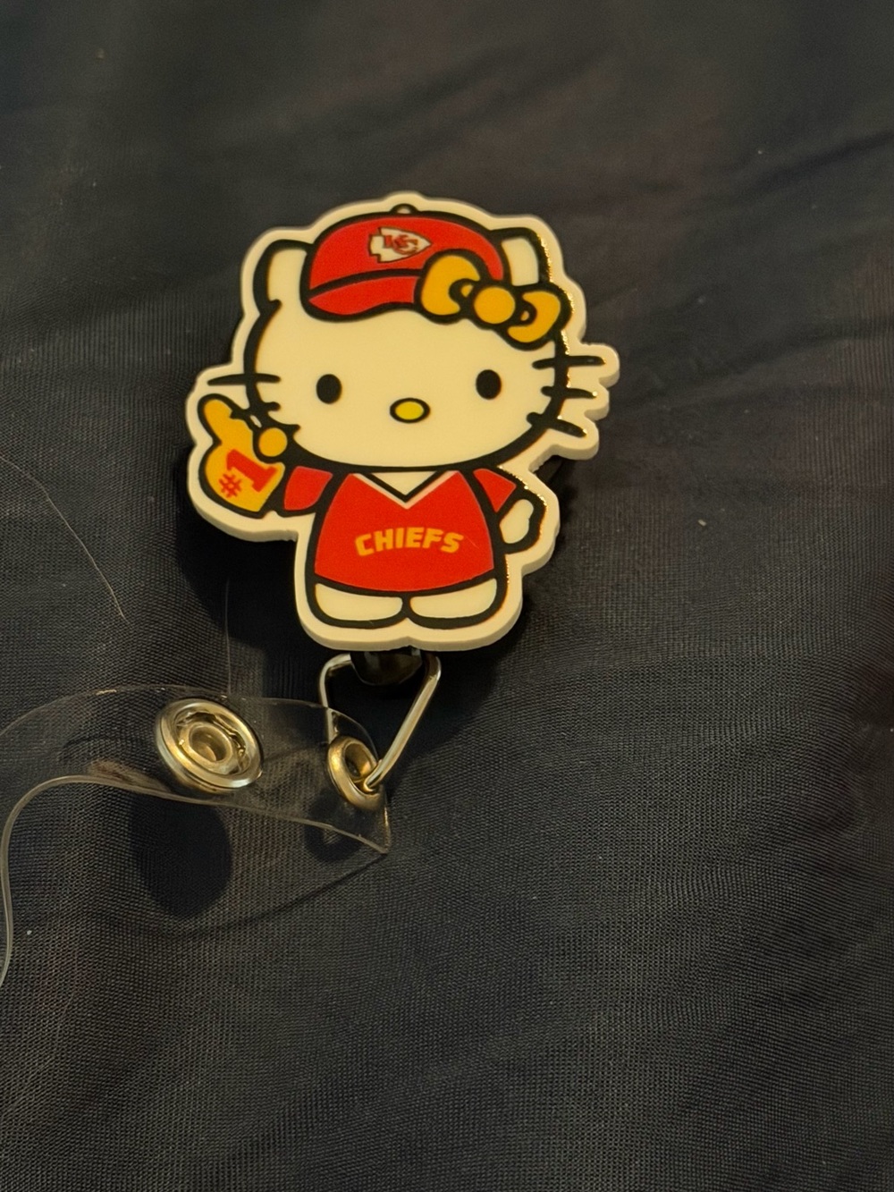 Hello Kitty x Chiefs Red Badge Reel - Cute Football Nurse ID Holder